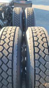 Rear view of Peterbilt 579 chassis showing dual rear tires with tread patterns.