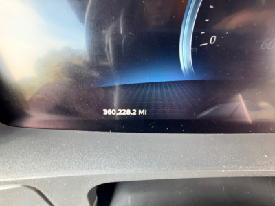 Kenworth T680 dashboard display showing odometer reading 360,228.2 miles.