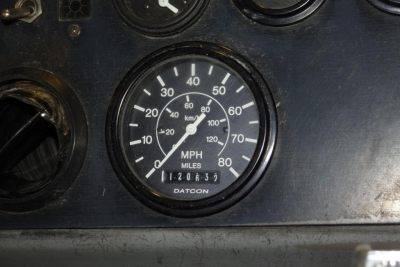 Dashboard gauge cluster with speedometer showing MPH and transmission odometer. Brand: Datcon visible in center.