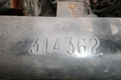 Metal engine component with stamped number '314362' visible in the center.