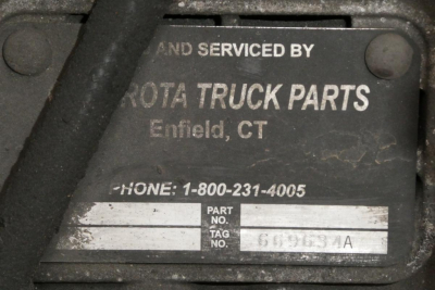 Tag on a truck part reading 'AND SERVICED BY TOYOTA TRUCK PARTS Enfield, CT' with phone number 1-800-231-4005 and a PART NO. tag area.