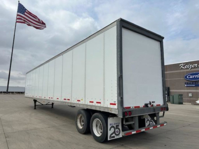 Trailer showing a white Wabash van trailer with dual rear axles and a closed rear door. Visible text includes stock number U90814, VIN 1JJV532D8EL812524, and '25' on mudflap.