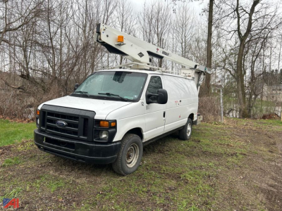 Ford E-350 bucket truck in-service showing bucket lift arm on roof rack and white utility van body.