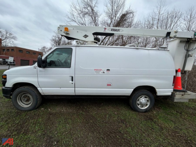 Ford E350 cargo van with bucket lift in side profile view showing utility body and lift arm.