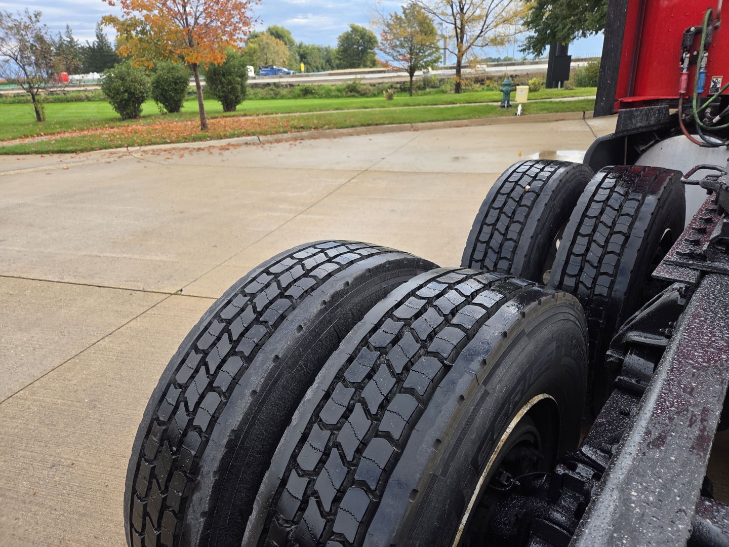 Kenworth T680 truck chassis rear dual rear axles with tires and fender view