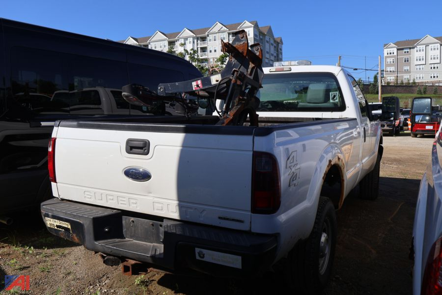 Ford F-250 Super Duty pickup truck rear view with equipment in bed