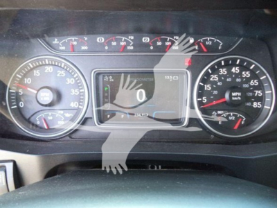 Dashboard of a 2020 International MV dump truck showing multiple gauges and a central digital display.
