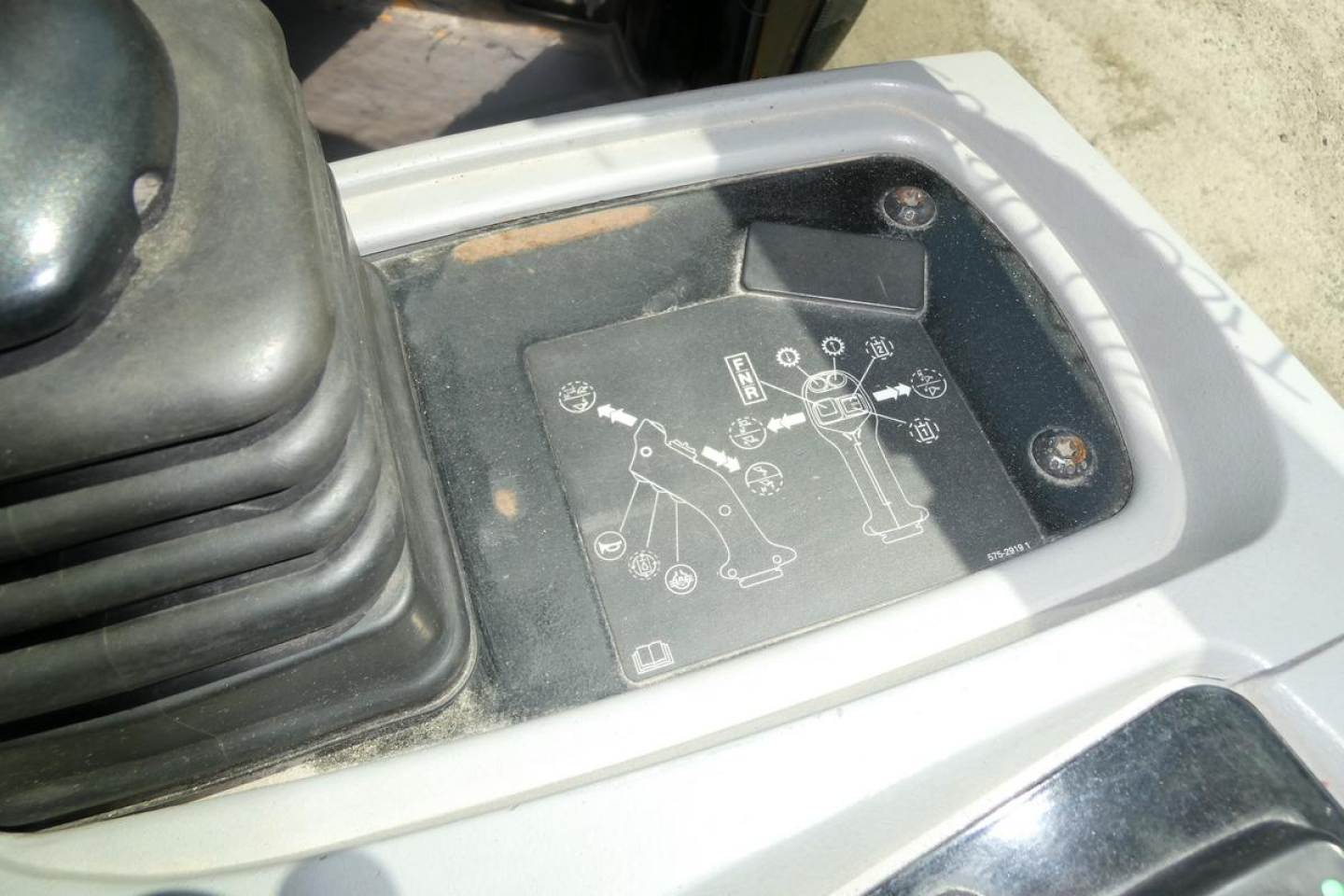 Caterpillar 914 wheel loader operator control panel area showing diagram label and control graphics.
