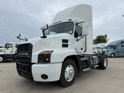 Truck: 2022 Mack AN42T daycab with sleeper, white exterior, front grille, dual tires, and side fuel tanks visible.