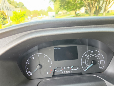 Dashboard of a 2024 Ford Transit 350 HD showing instrument cluster and odometer display with PRNDM gear indicator.