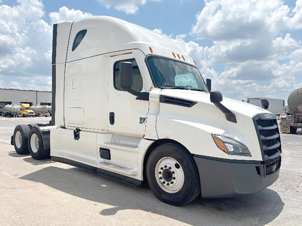 White 2022 Freightliner Cascadia 126 sleeper cab truck, side view, with VIN plate and stock number 550542 visible in listing context.