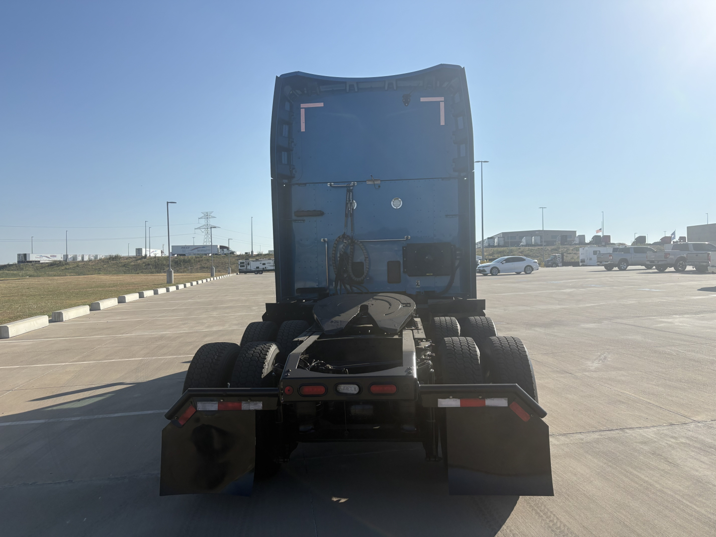 Peterbilt 579 truck rear view showing chassis and fifth wheel with dual rear axles