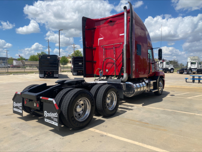 2020 Mack AN64T70 highway tractor rear and side views showing tandem axles and red sleeper cab, visible branding on mudflaps and fuel tanks.
