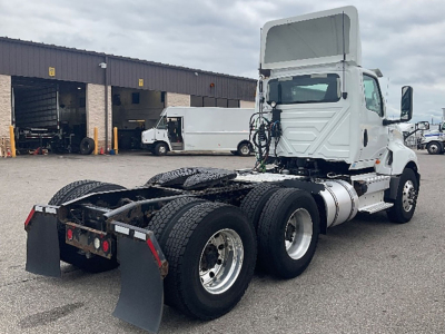 Truck chassis of a 2019 International LT625 daycab showing rear axle configuration and cab; no cab interior text visible.