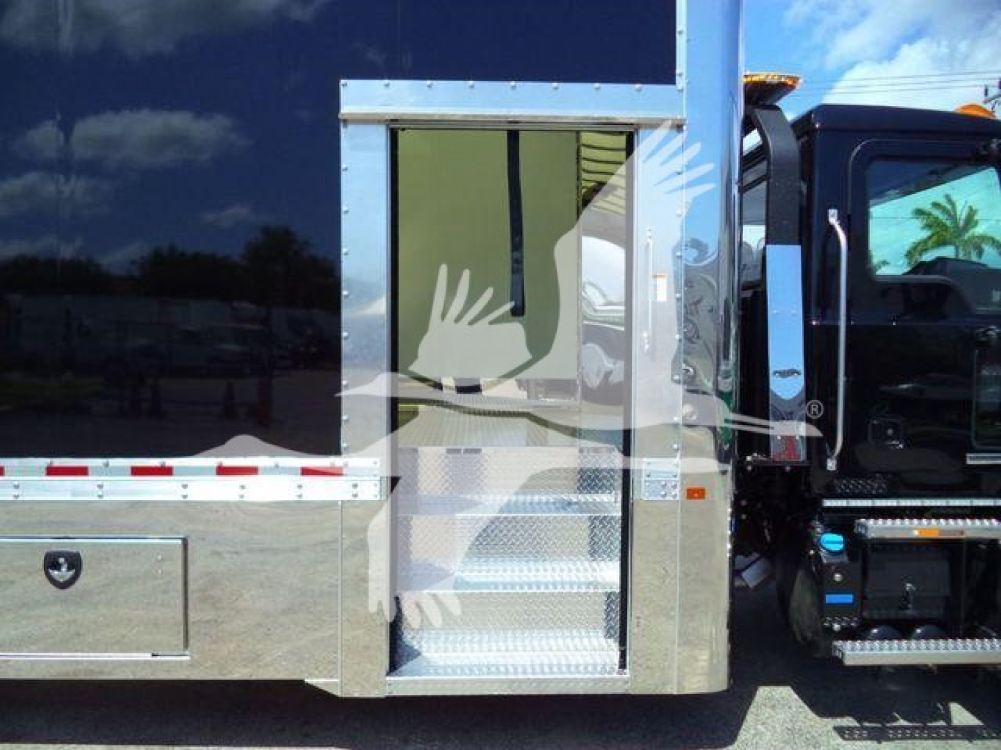 2026 Mack MD6 rollback truck, side entry with aluminum steps and chrome box, stock tag 26FTMD6TOWBOX visible