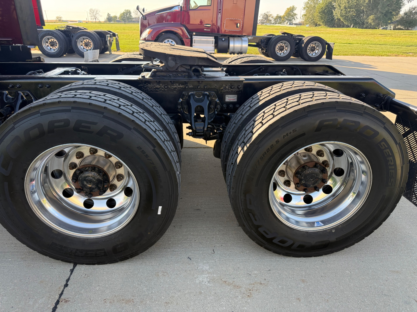 Kenworth T680 dual rear wheels on rocker area and chassis frame, with tires labeled Goodyear Endurance and chrome wheel rims visible.