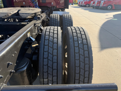 Kenworth T680 rear wheel dual axle showing tires and chassis.