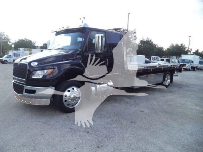 Truck: 2027 International MV rollback tow truck in black, front and side views visible with extended flatbed; chrome front bumper, dual rear wheels, large mirrors.