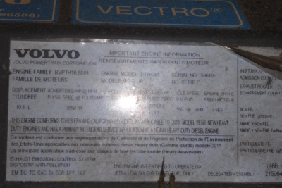 Volvo engine information plate with engine family and serial numbers, VIN and displacement. Visible text includes VOLVO, VECTRO, engine family BVPH7H8501, displacement 6.8L, serial no 5660-? and serial plates; general engine data obscured b
