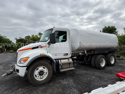 Peterbilt 548 water truck with a 4000 gallon tank, side view showing cab and tanker