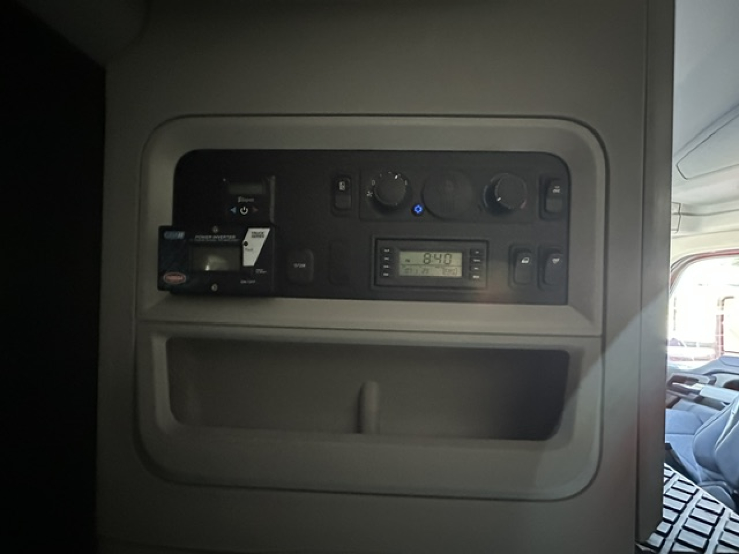 Kenworth T680 truck interior panel showing radio and controls