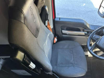 Kenworth T680 truck driver's seat and interior view showing seat and door panel