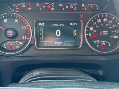 Instrument cluster and digital gauge panel of a 2022 International LT showing speedometer at 0 mph, tachometer, and various indicators.