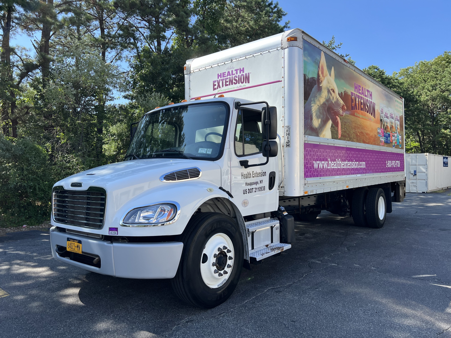 Box truck with Health Extension advertising on cargo box, Freightliner M2 series, white cab, VIN visible on listing, in-service used condition.