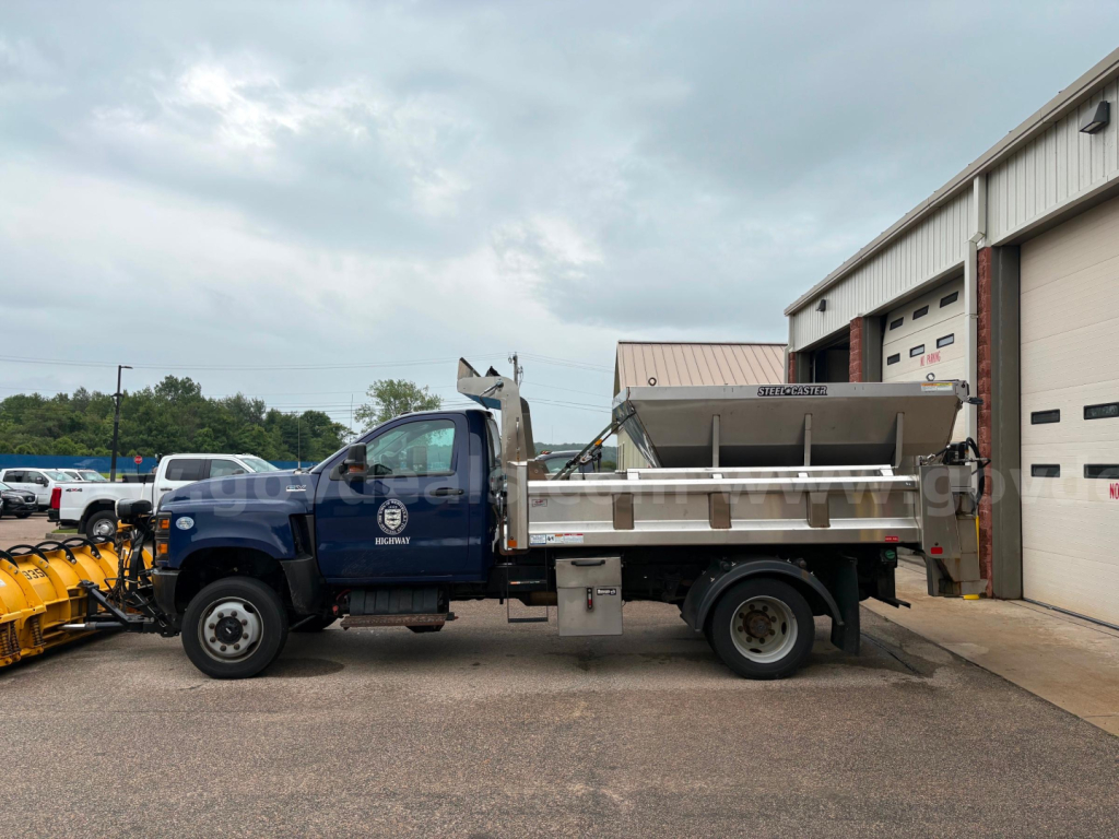 International CV515 dump truck side view showing dump bed and cab with stock number 7062-252.
