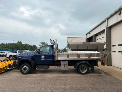 International CV515 dump truck side view showing dump bed and cab with stock number 7062-252.