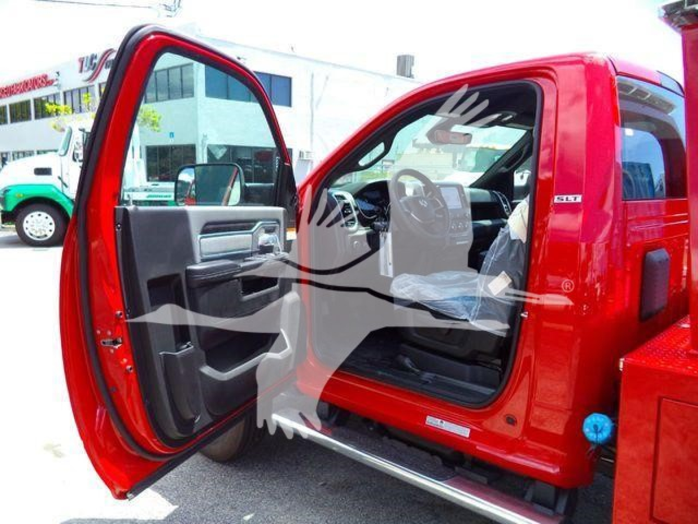 Ram 4500 SLT pickup truck door open showing interior and driver seat with red exterior and a winch category listing.