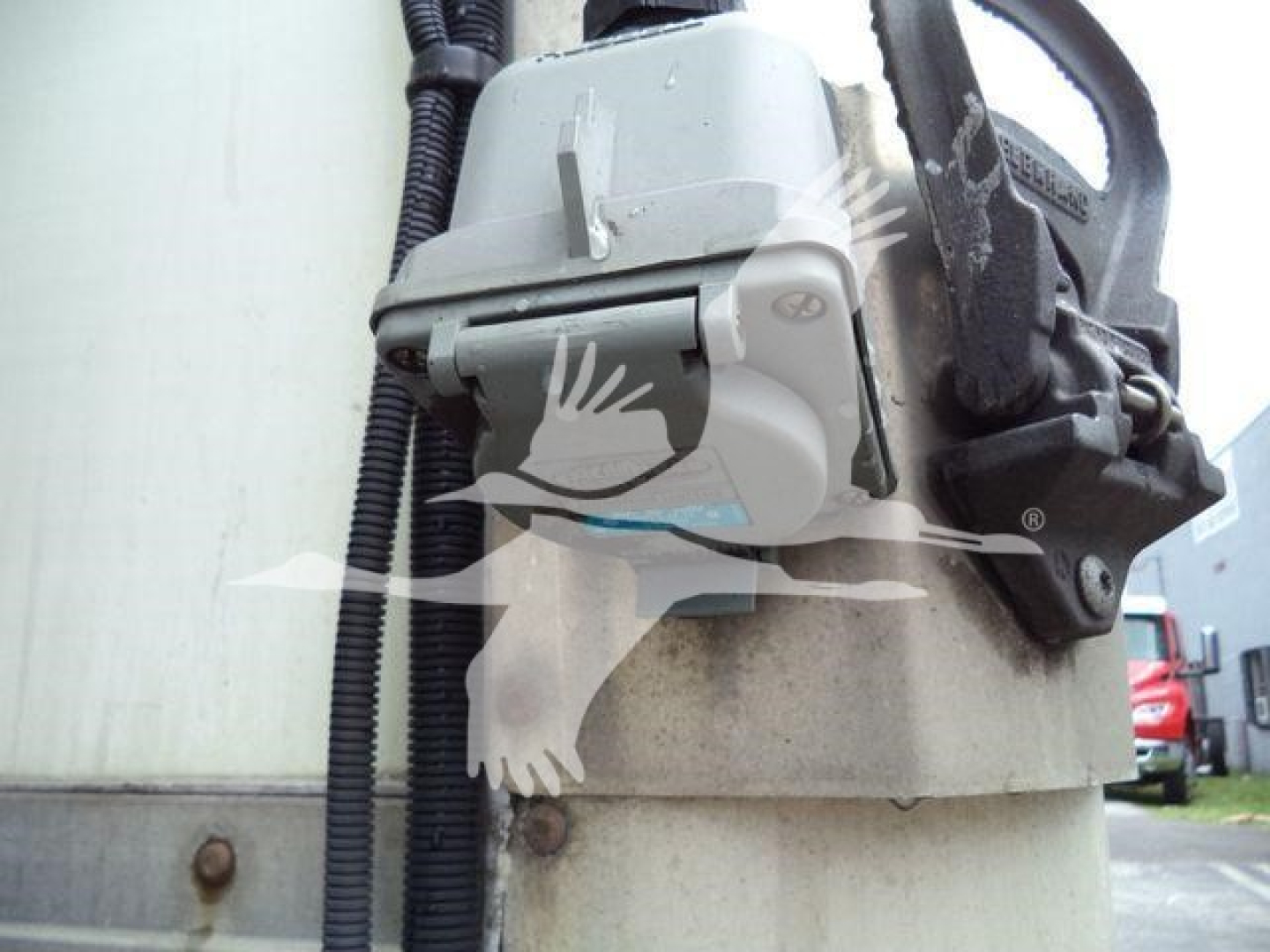 Hino 195 refrigeration truck component showing electrical connector and wiring harness on a hopper or mounting surface.