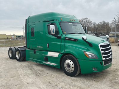 Green Freightliner Cascadia126 semi-truck cab side view showing sleeper with chrome steps and black trim.