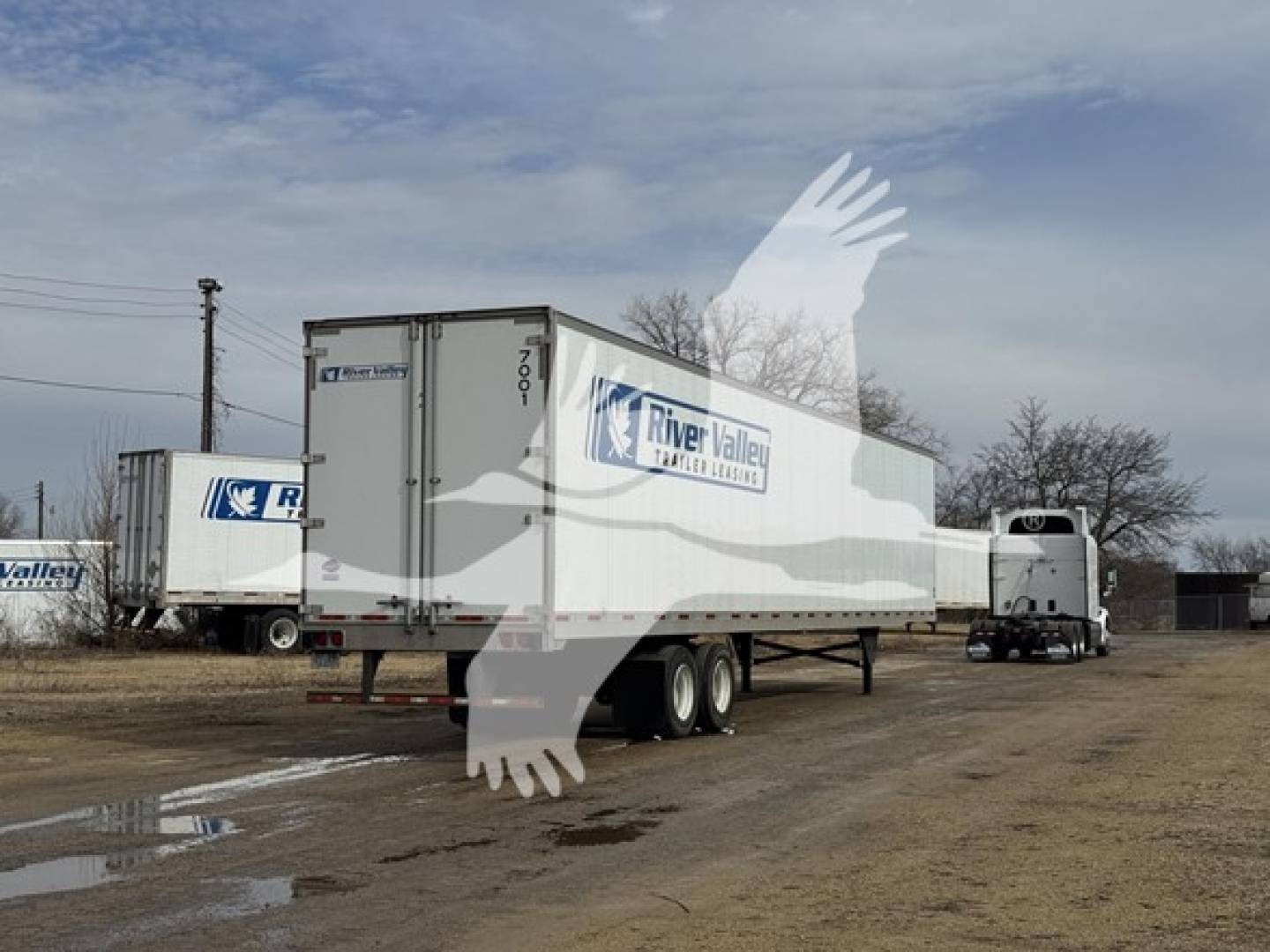 Trailer view showing a 2017 utility dry van with River Valley trailers branding on the side and rear doors.