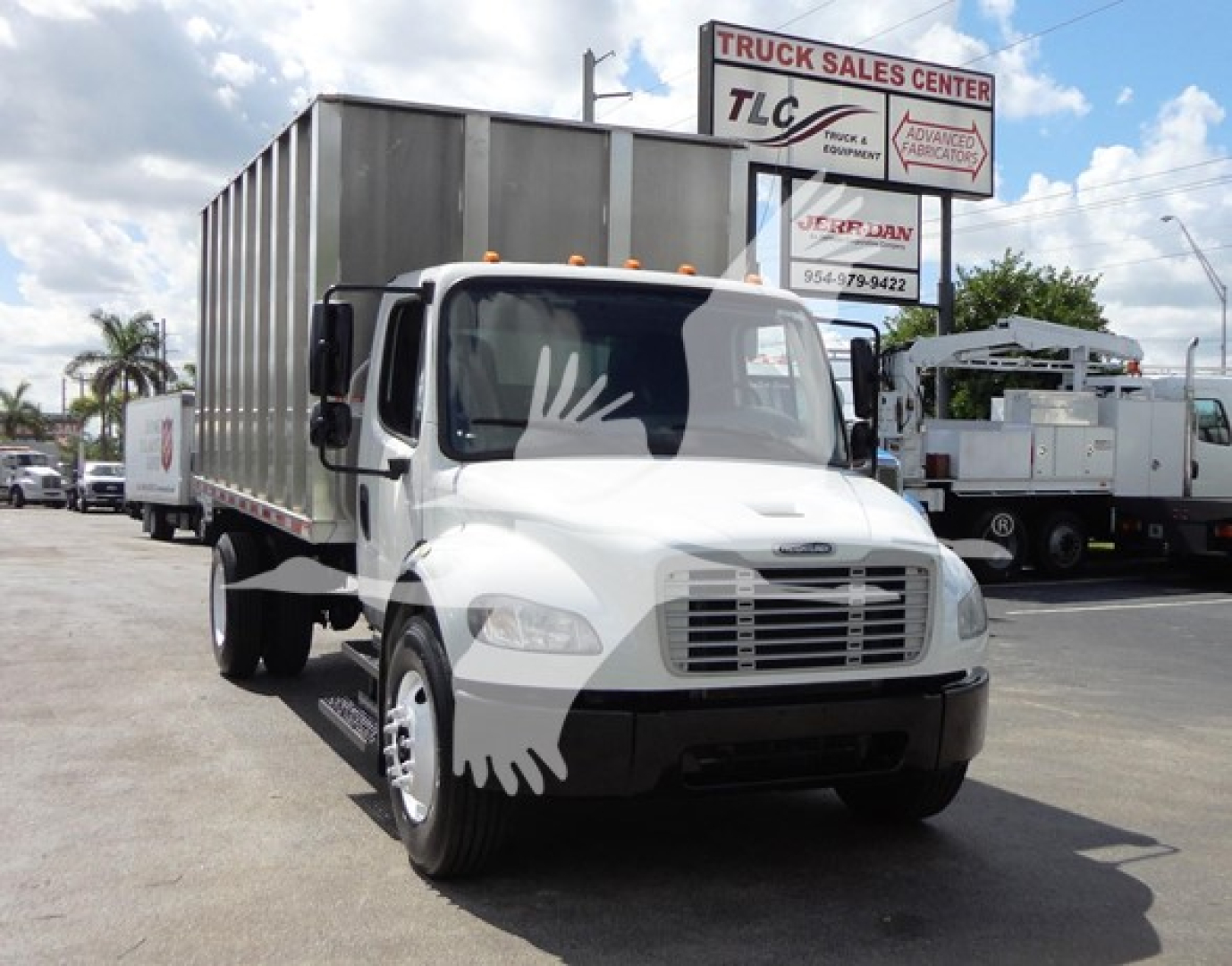 Truck image: 2014 Freightliner M2 106 chassis with chipper body, white cab, gray cargo box, front grille, headlights visible.
