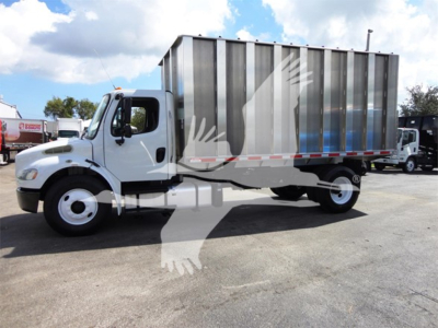 2014 Freightliner M2 106 dump truck side view showing chipper body, white cab, large silver gray dumping container, and black wheels.