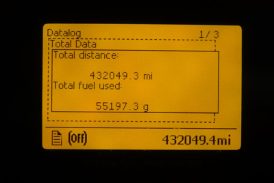 Digital display showing total data: total distance 432049.3 mi, total fuel used 55197.3 gal, odometer reading 432049.4 mi.