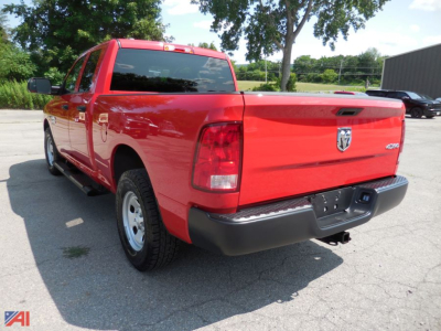 Ram 1500 Classic Tradesman quad cab pickup truck rear view showing bed and tailgate.