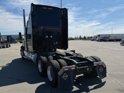 Truck rear view showing fifth wheel and dual rear axles on a used 2022 International LoneStar conventional sleeper.
