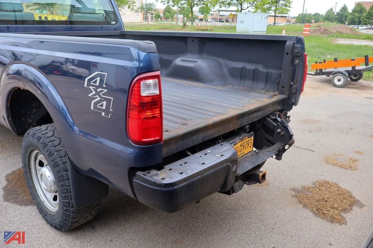 Ford F-350 Super Duty pickup truck bed with plow attachment in a used listing.