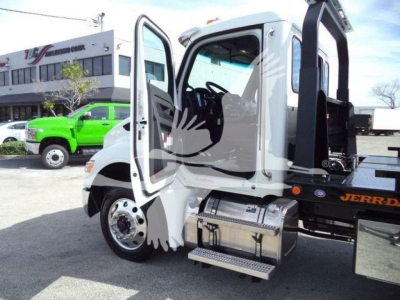 Kenworth T280 roll-back truck cab with open door, side steps, and chrome fuel tanks; white exterior and black bed frame visible.