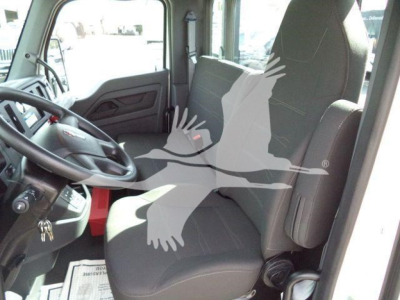 Kenworth T280 truck cabin interior showing driver and passenger seats, steering wheel, and dashboard.