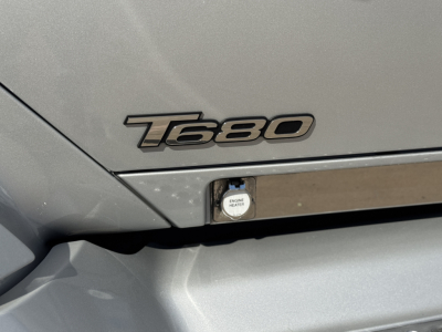 Kenworth T680 engine bay badge T680 near hood with DEF/engine heater indicator
