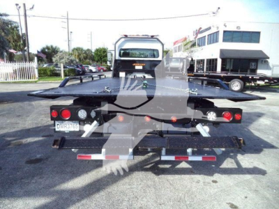 Flatbed tow truck bed rear with platform and lights, seen from back, Freightliner M2 106 Plus bow in worn area