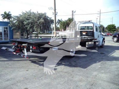 Flatbed tow truck rear and cab view with loading equipment, Freightliner M2 106 Plus chassis, stock JG8187.