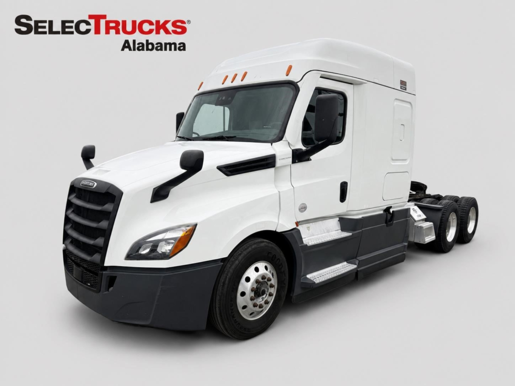 Freightliner Cascadia 126 sleeper cab tractor in white, front-left angle, with SelecTrucks Alabama logo in corner.