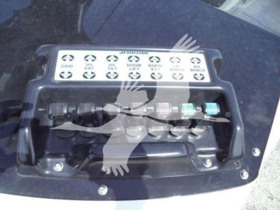 Winch controls panel with labeled switches and wiring on Ram truck bed; labels include GD, LTL, UCL, TILT, BOOM, WINCH, and HAWSE lines.