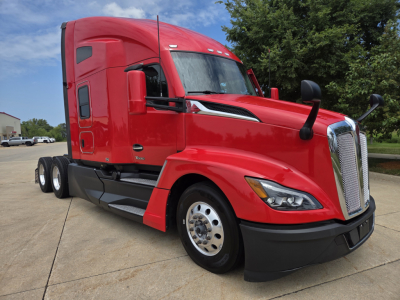 Kenworth T680 tractor-trailer in red, side view showing aerodynamic hood and sleeper cab, no visible text.