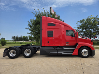 Kenworth T680 semi-truck in red, side view showing sleeper cab, three rear axles, chassis, wheel rims; no visible branding text on side.