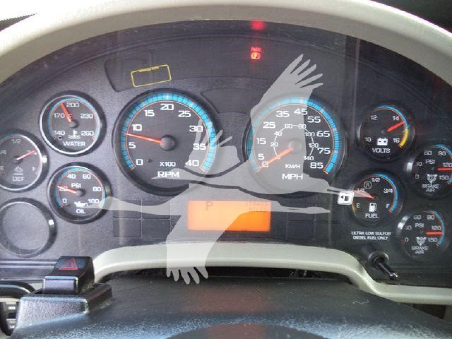 Dashboard gauges and instrument cluster of a 2019 International Durastar 4300, with RPM, speedometer, and warning indicators visible.